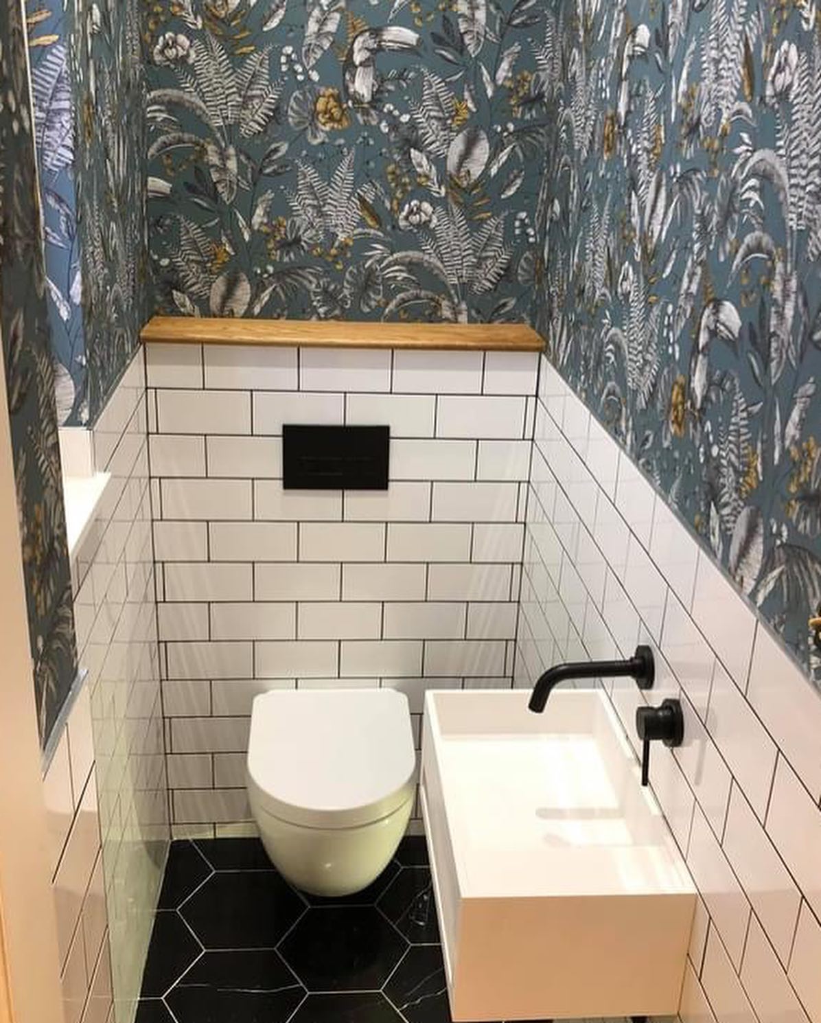 Contemporary luxury cloakroom with premium sanitaryware