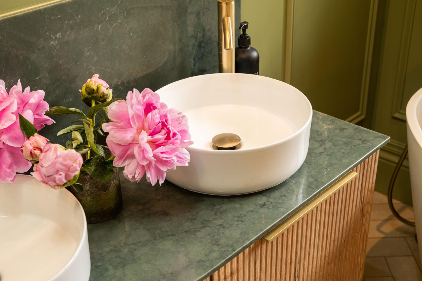 Luxury downstairs cloakroom designed with statement finishes